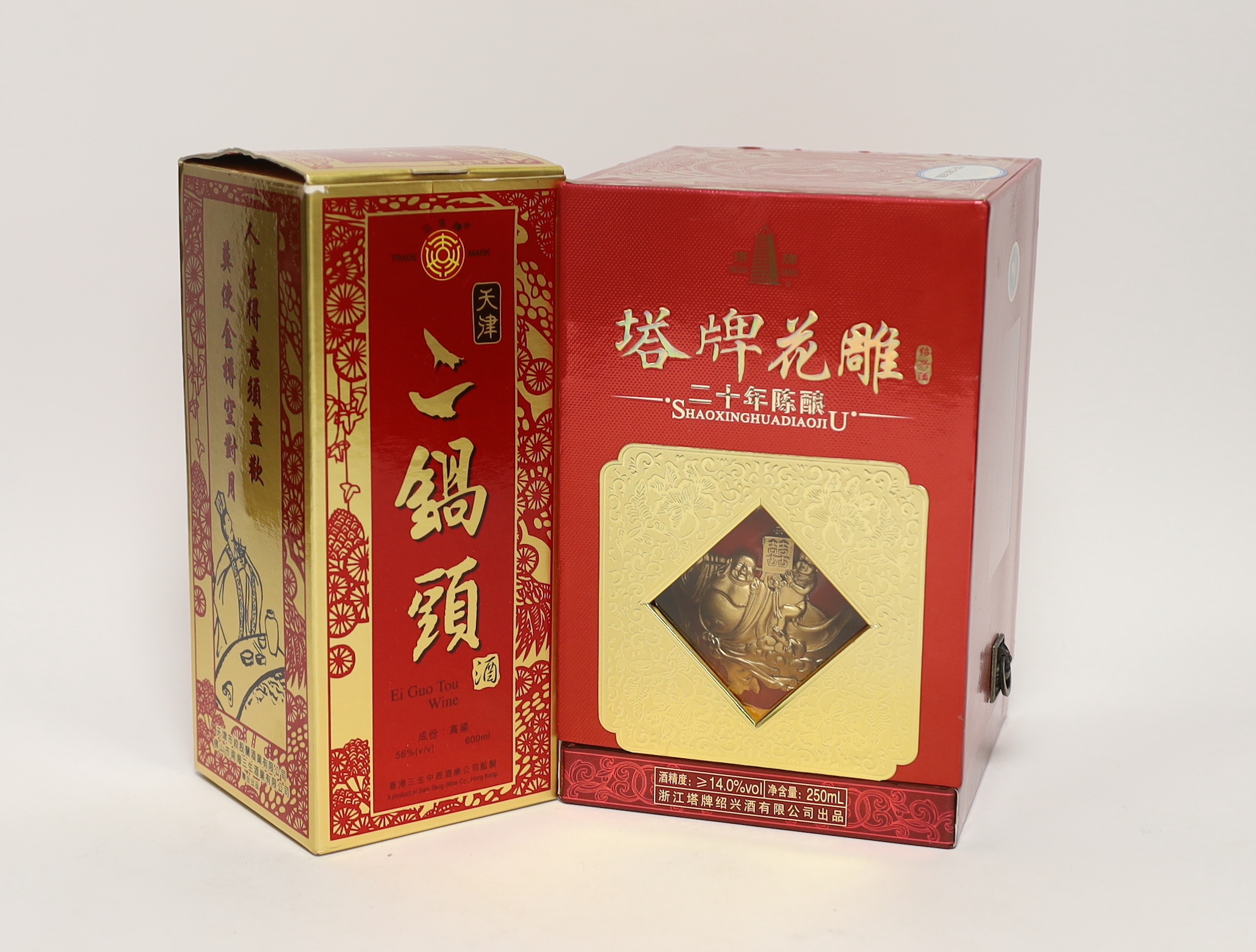 One bottle of Shaoxing Huadiao Jiu Wine, Pagoda Brand Box, 14% Vol, 250ml and one bottle of Ei Guo Ton Wine, Product of Sam Seng Wine Co Hong Kong, PD12/07/25, 56% Vol, 600 ml.